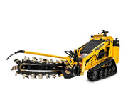 The Scintex Paddock Tracked Mini Loader (Diesel Engine) features a yellow and black design, a large rotating digging chain and blade for trenching, and boasts excellent compatibility with various mini loader attachments.