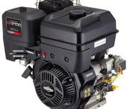 A Paddock Stump Grinder with a black heavy-duty Briggs & Stratton XR2100 420cc engine, visible cooling fins, pull start, fuel tank, and warning labels is shown against a white background.