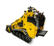 A yellow Scintex Paddock Tracked Mini Loader - Diesel Engine with black tracks, rear standing platform, and control levers is shown from the rear. This mini loader offers excellent attachment compatibility against a white background.
