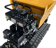 A close-up of the Paddock Tracked Lifting/Tipping Power Barrow by Paddock, featuring control levers, a visible engine, and rubber tracks. This yellow power barrow offers an 800kg capacity and is photographed against a white background.