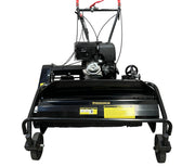 Front view of the Paddock Walk Behind Flail Mower 12HP - 900mm by Paddock, featuring red handles, visible engine, yellow caution labels, two front wheels, and a wide dethatching roller—ideal for vegetation control.