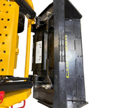 Overhead view of the Paddock Tracked Cabin Loader Pro’s front bucket attachment, showing its black metal scoop, hydraulics, and safety labels. Brand: Paddock. Model: Pro - 40hp Perkins Turbo Diesel Engine (Ex Demo). Isolated on white background.