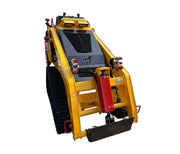 A Paddock™ Tracked Mini Loader Pro, featuring a 58hp Yanmar 4-cylinder turbo diesel engine, is seen from the rear with its distinctive yellow finish, rubber tracks, control levers, and engine ventilation grille visible—an outstanding example of versatile construction equipment and powerful compact loaders from Paddock.